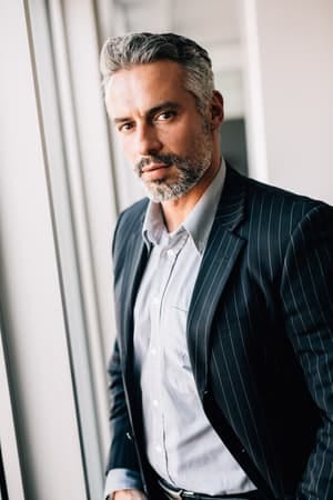 a portrait of an attractive middle-aged man