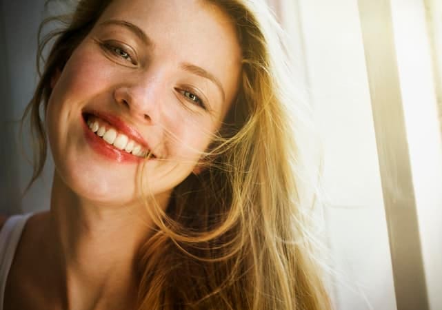 attractive smiling girls in a sunbeams