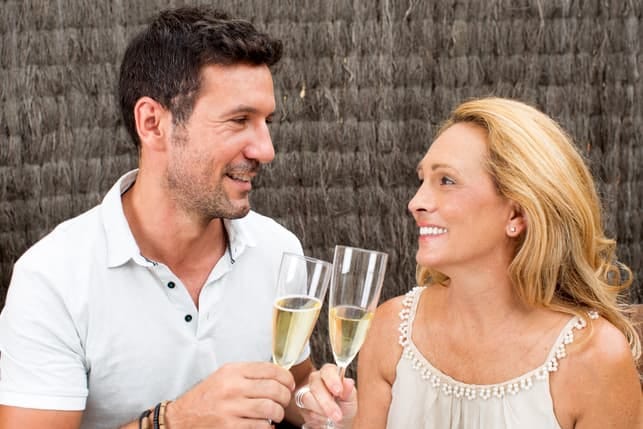 a mature couple drinking wine and having a nice date